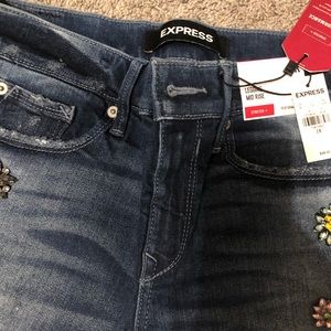 Express jeans with flower stones